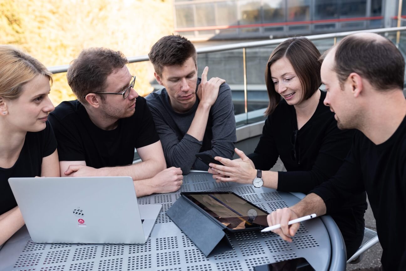 Pieoneers team is meeting outside to review the daily progress and discuss fresh ideas. The team is made of talented software engineers, designers, and software architects. Get in touch today.
